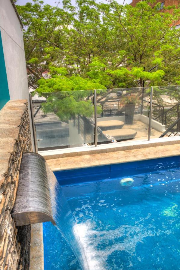 Casa De Leda, A Kali Hotel 산타마르타 외부 사진 A pool barrier