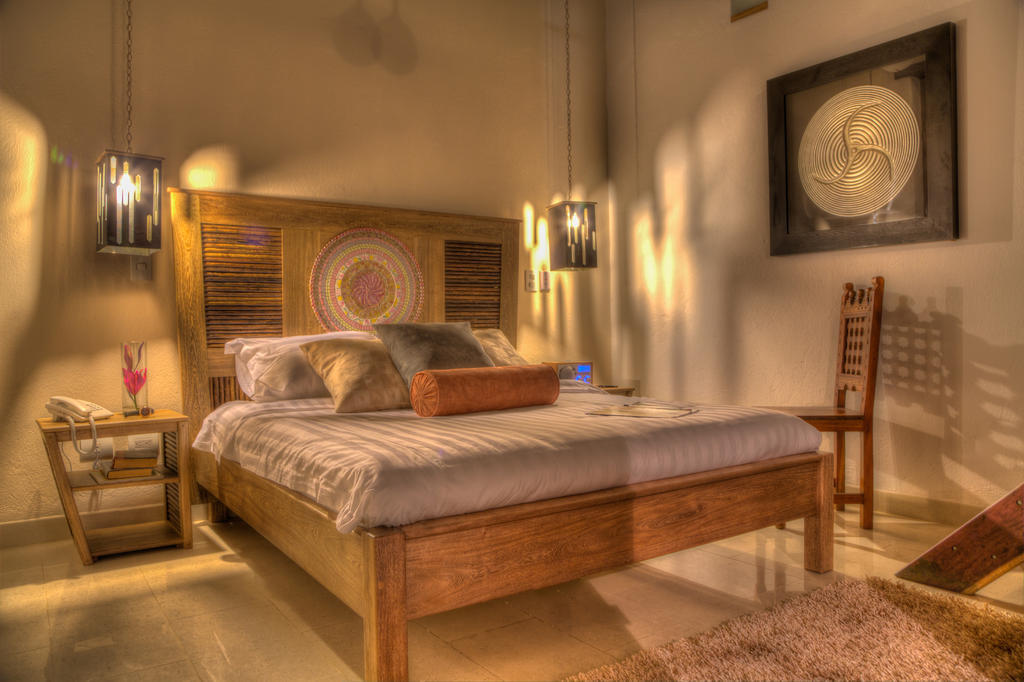 Casa De Leda, A Kali Hotel 산타마르타 객실 사진 A bedroom at the hotel